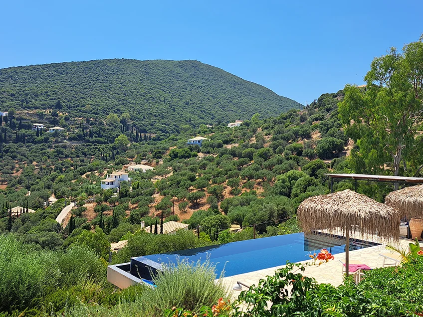 Villa with infinity pool and view over Greek landscape