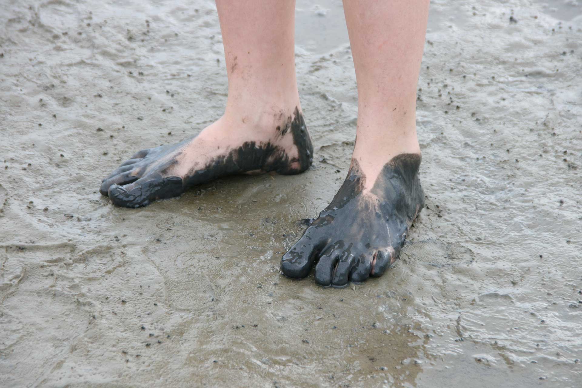 Füße im Wattenmeer
